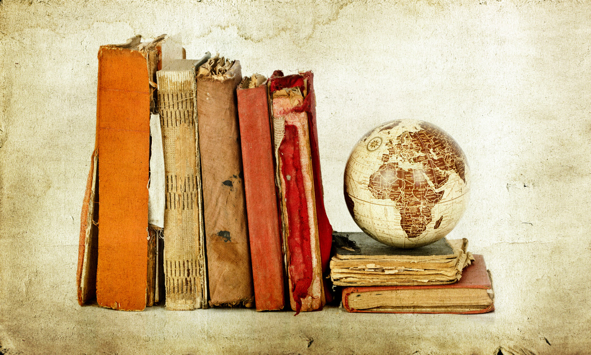 Old books and Earth globe